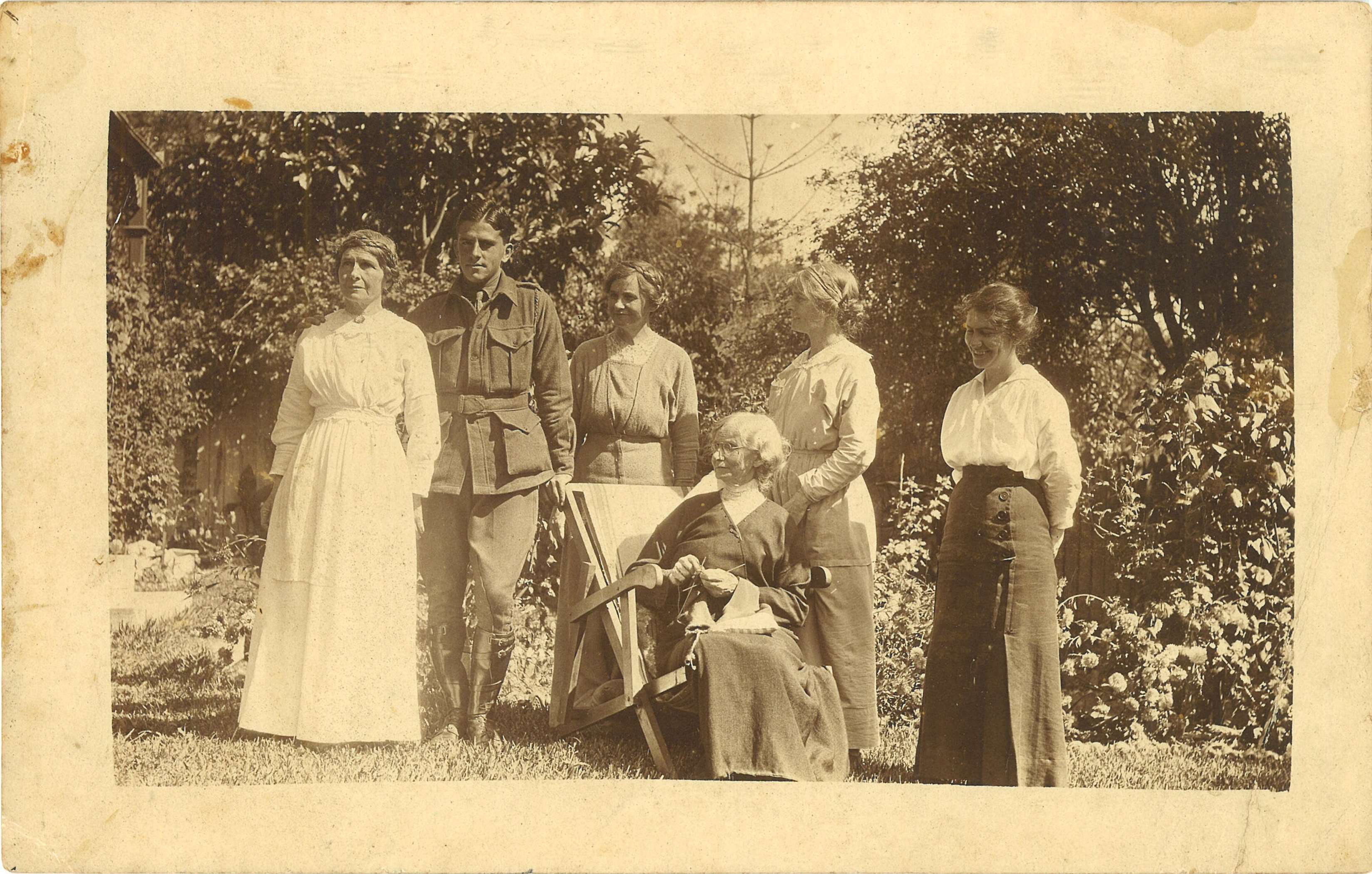 The Thorburn sisters and their niece Elgin Macgregor with Robert Barnet 
in uniform in the garden at Meroogal, Nowra, March 1916 / Robert Barnet