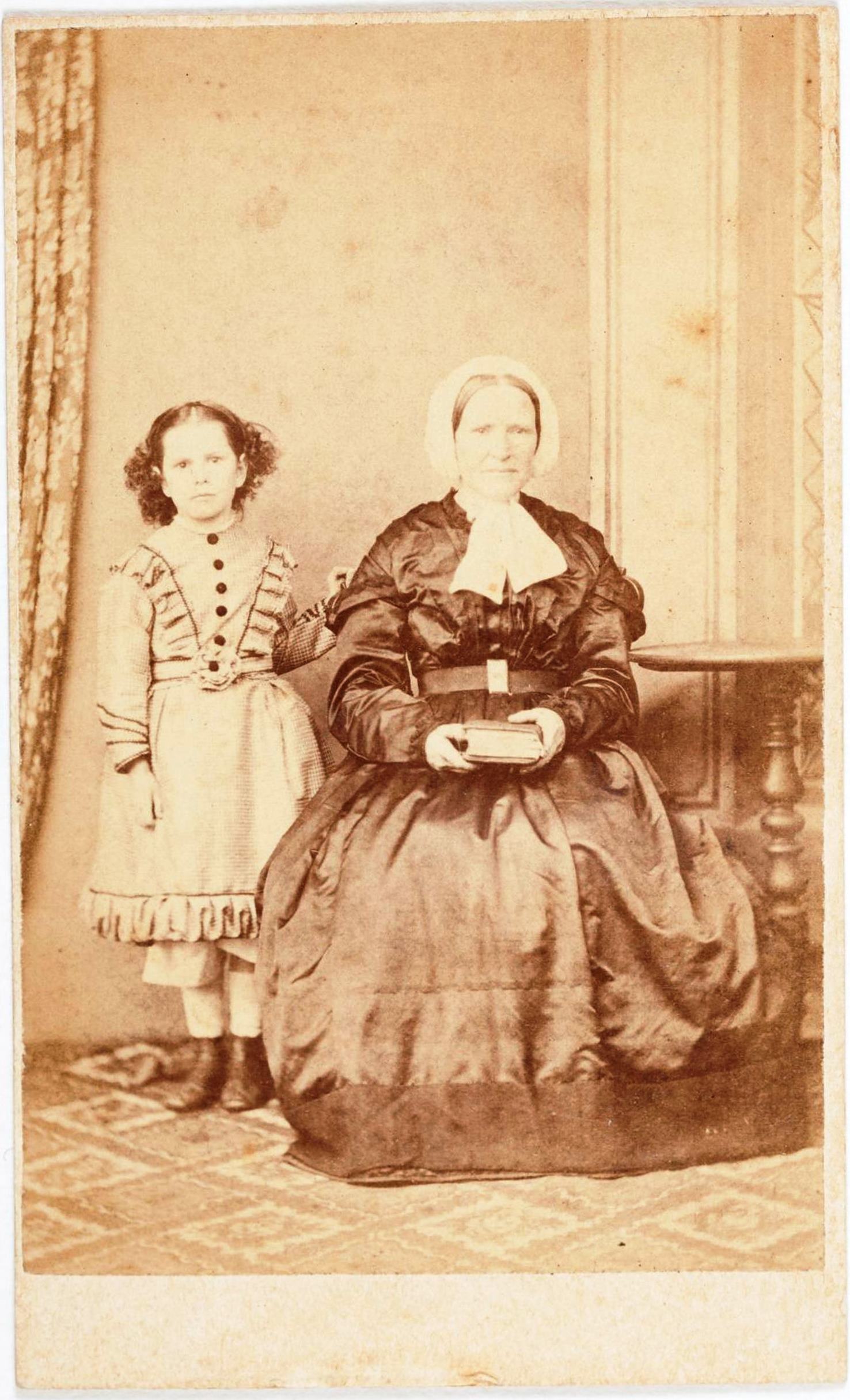 Tottie Thorburn with her grandmother Mary McKenzie, around 1874 / 
James Brothers, London Portrait Studio, Kiama